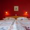 Turistická farma Pri Biscu, Bled - Dvoulůžkový pokoj 2 s manželskou postelí a přistýlkou - Pokoj