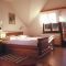 Turistická farma Pudvoi, Brežice - Dvoulůžkový pokoj 1 s manželskou postelí a vlastní koupelnou - Pokoj